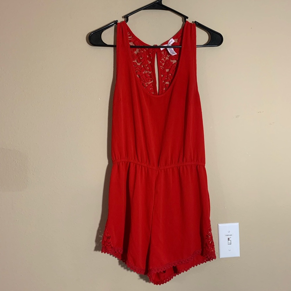Red Romper with lace on side